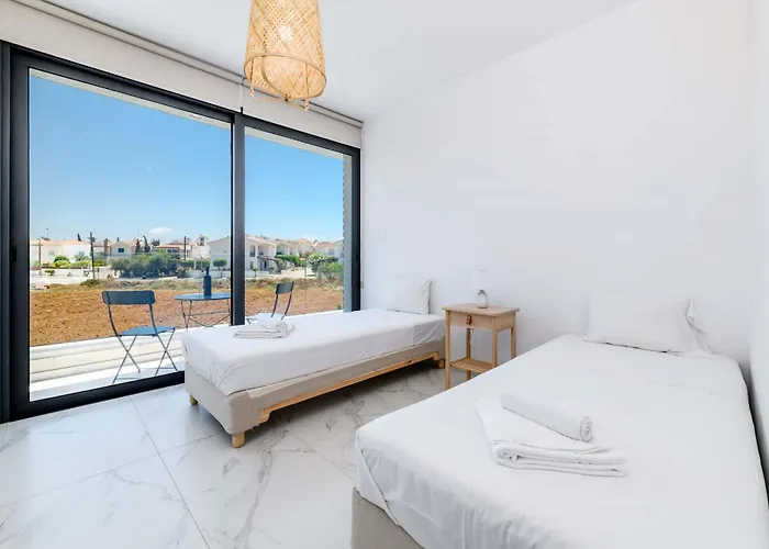 By The - White Coral Vila