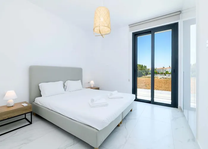 By The - White Coral Protaras